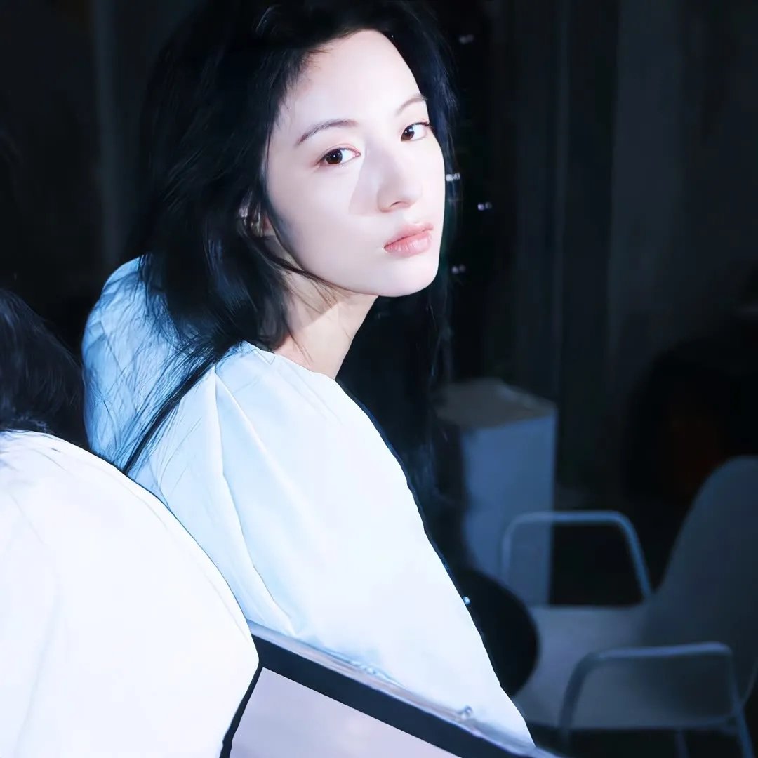彼女